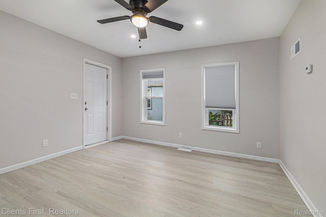 26358 Moses St, Flat Rock, MI 48134 - unfurnished room featuring light wood-style flooring, baseboards, a ceiling fan, and recessed lighting