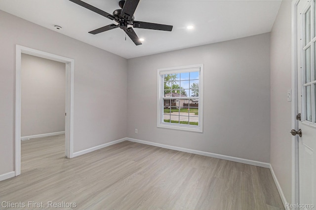 26358 Moses St, Flat Rock, MI 48134 - unfurnished bedroom with light wood-style flooring, baseboards, recessed lighting, and a ceiling fan