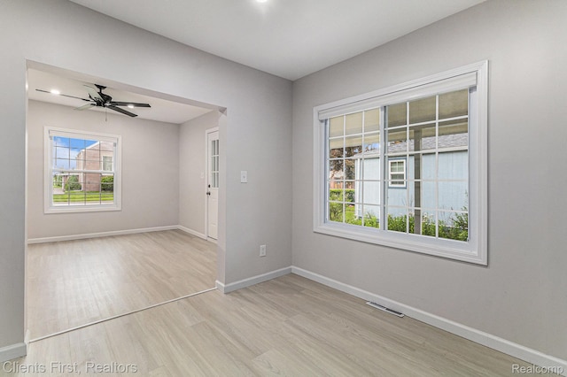 26358 Moses St, Flat Rock, MI 48134 - empty room featuring light wood-type flooring, baseboards, and ceiling fan