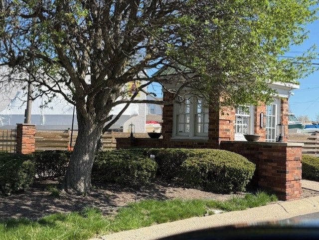 view of property exterior featuring fence
