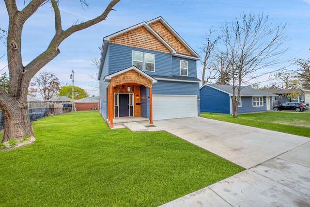 view of front of home with fence, concrete driveway, a front yard, and a garage