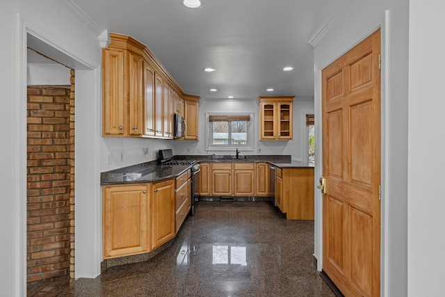 kitchen with crown molding, a sink, granite finish floor, stainless steel appliances, and recessed lighting