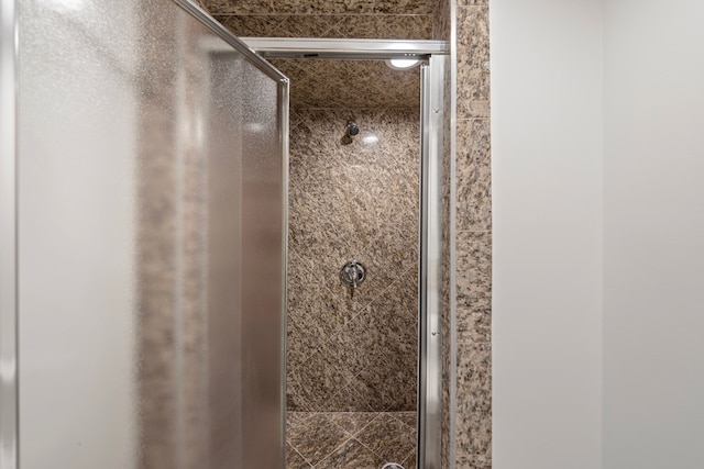 bathroom featuring a stall shower