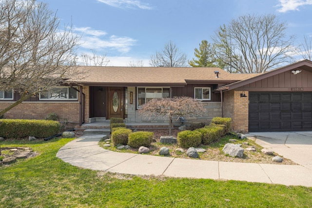 ranch-style house featuring roof with shingles, board and batten siding, an attached garage, and brick siding