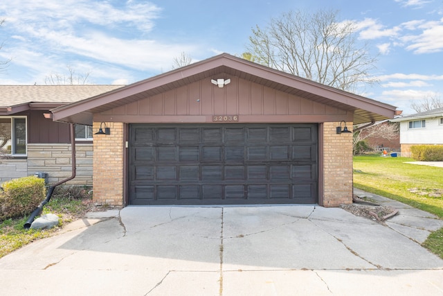 garage featuring driveway