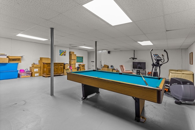 game room featuring billiards, finished concrete floors, and a drop ceiling