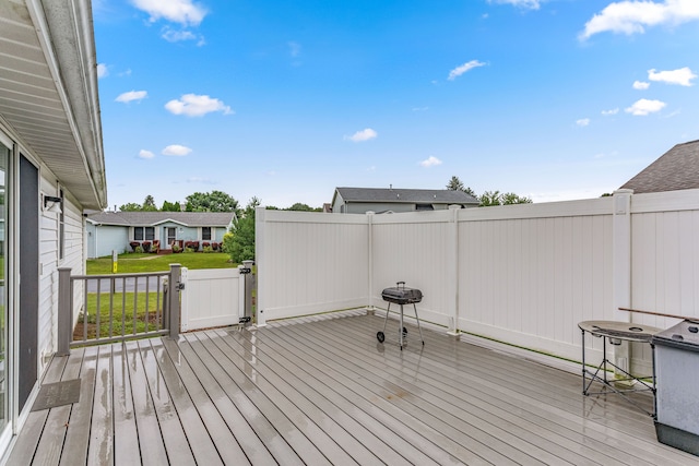 deck featuring a yard