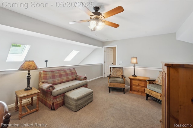 1317 Peppergrove Dr, Brighton, MI 48116 - living room featuring a skylight, carpet floors, vaulted ceiling, a ceiling fan, and baseboards