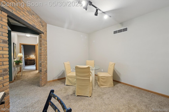 1317 Peppergrove Dr, Brighton, MI 48116 - unfurnished dining area featuring carpet, track lighting, and baseboards