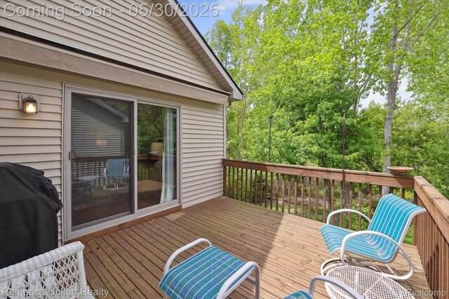 1317 Peppergrove Dr, Brighton, MI 48116 - wooden terrace with a grill