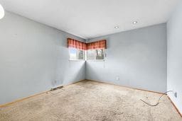 unfurnished room with carpet
