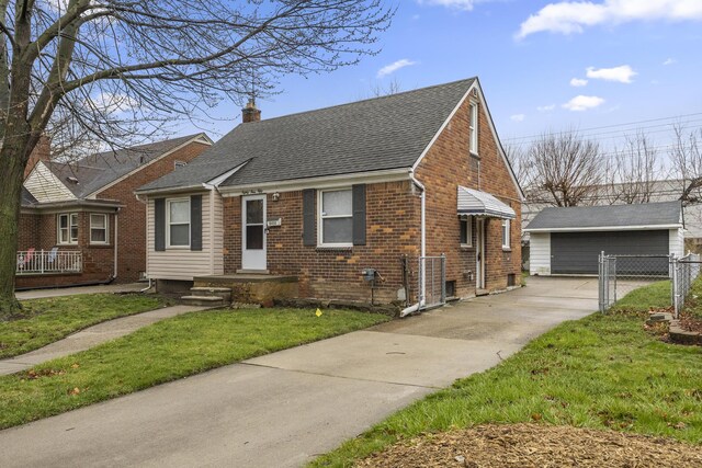 8450 Warren Blvd, Center Line, MI 48015 - view of front of property featuring a chimney, fence, a front lawn, roof with shingles, and brick siding