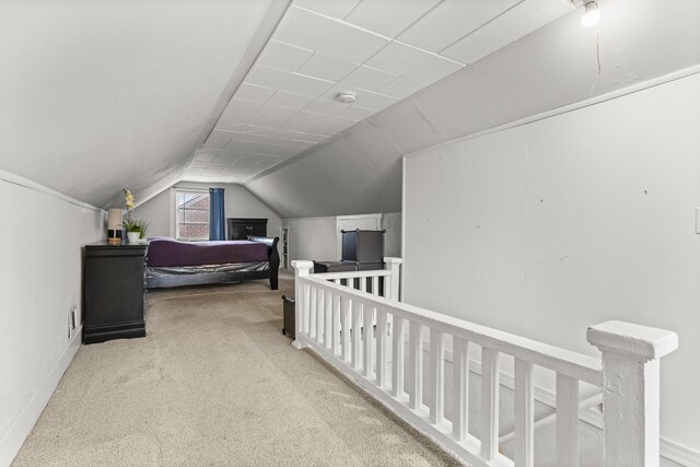 8450 Warren Blvd, Center Line, MI 48015 - carpeted bedroom with vaulted ceiling and baseboards