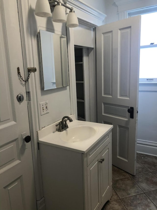 bathroom with vanity and tile patterned floors