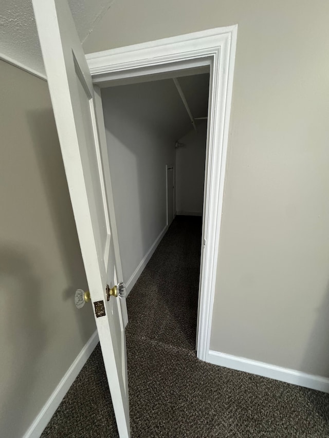 22051 Firwood Ave, Eastpointe, MI 48021 - corridor with baseboards and dark carpet