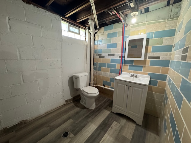 22051 Firwood Ave, Eastpointe, MI 48021 - bathroom with wood finished floors, vanity, and toilet