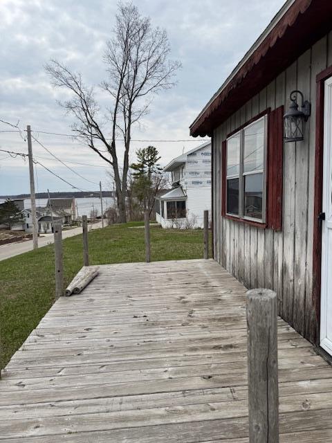 314 W Main, Whitehall, MI 49461 - wooden terrace with a lawn