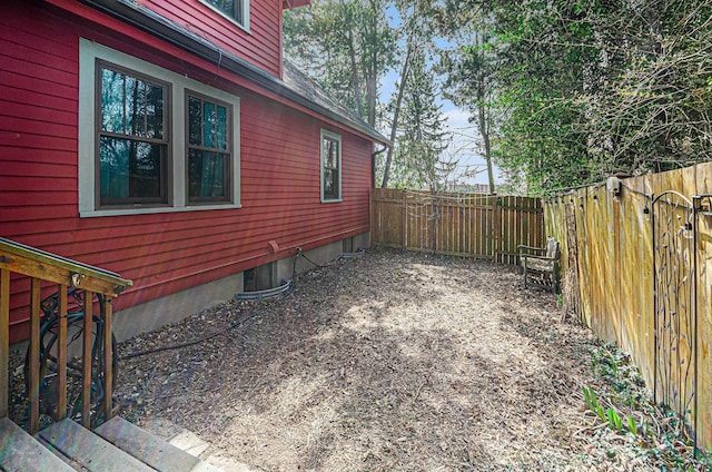 view of yard featuring a fenced backyard