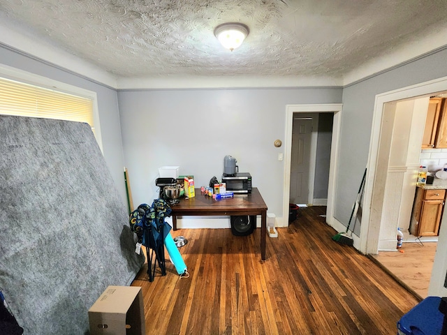 20117 Santa Rosa Dr, Detroit, MI 48221 - office space featuring wood finished floors, a textured ceiling, and baseboards