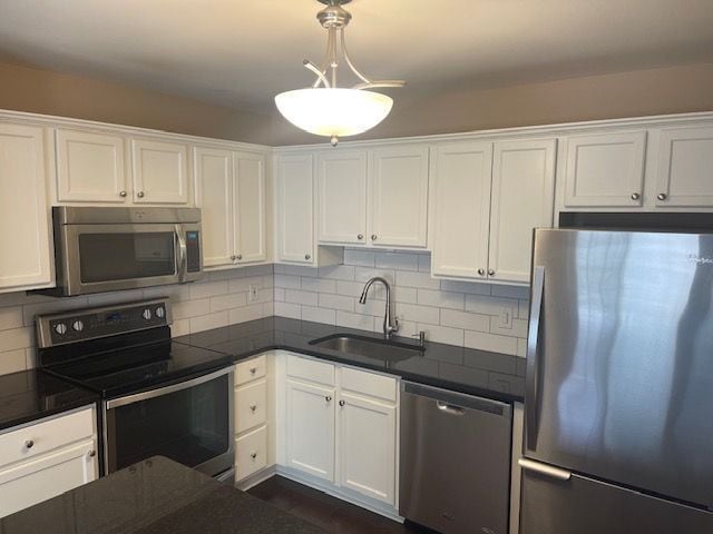 500 Romeo Rd Unit 116, Rochester, MI 48307 - kitchen with stainless steel appliances, white cabinets, and a sink