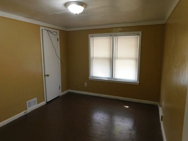 15864 Bringard Dr, Detroit, MI 48205 - spare room with visible vents and baseboards