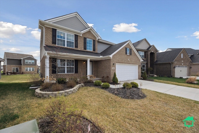 traditional-style house with a porch, brick siding, a front yard, and concrete driveway
