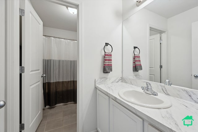 bathroom featuring vanity and tile patterned flooring