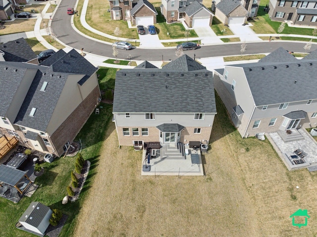 drone / aerial view with a residential view