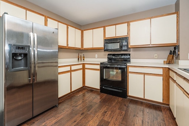 6472 Lochaven Ln, Waterford, MI 48327 - kitchen with black appliances, dark wood finished floors, and light countertops