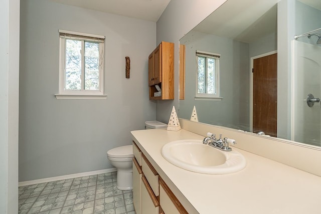 6472 Lochaven Ln, Waterford, MI 48327 - bathroom with plenty of natural light, toilet, a shower, and baseboards