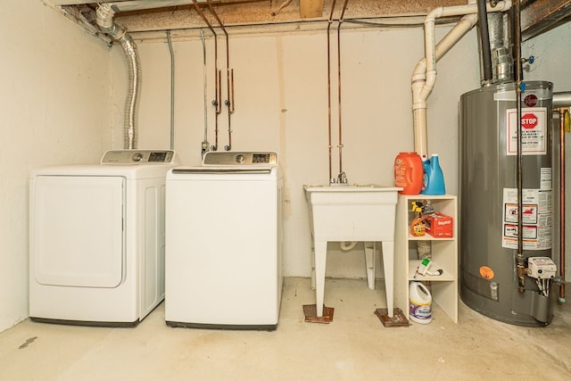 6472 Lochaven Ln, Waterford, MI 48327 - laundry area featuring water heater and washer and dryer