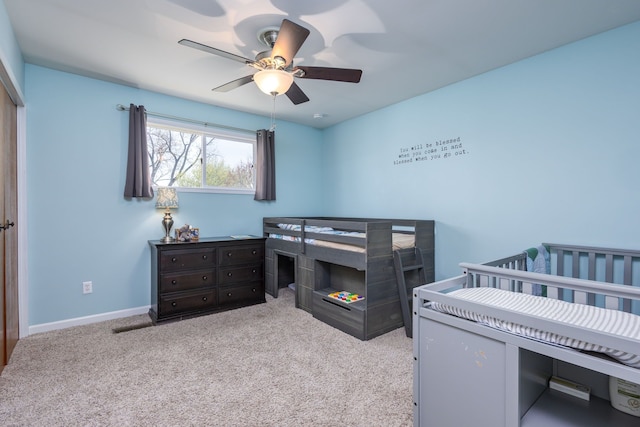 bedroom with carpet, baseboards, and ceiling fan