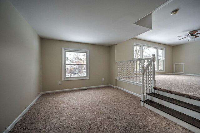 4238 Still Meadow Ln, West Bloomfield, MI 48323 - carpeted spare room with ceiling fan, baseboards, and a smoke detector