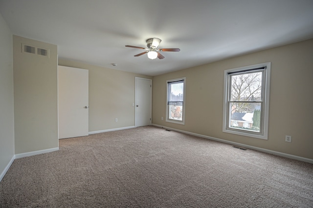 4238 Still Meadow Ln, West Bloomfield, MI 48323 - carpeted spare room with a ceiling fan and baseboards