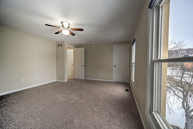 4238 Still Meadow Ln, West Bloomfield, MI 48323 - carpeted spare room featuring ceiling fan, plenty of natural light, and baseboards