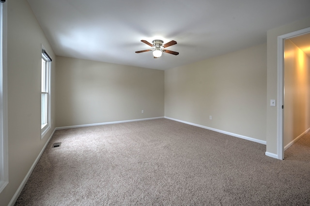 4238 Still Meadow Ln, West Bloomfield, MI 48323 - spare room featuring carpet flooring, ceiling fan, and baseboards