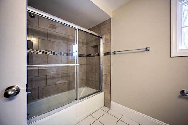 4238 Still Meadow Ln, West Bloomfield, MI 48323 - bathroom with tile patterned floors, bath / shower combo with glass door, and baseboards