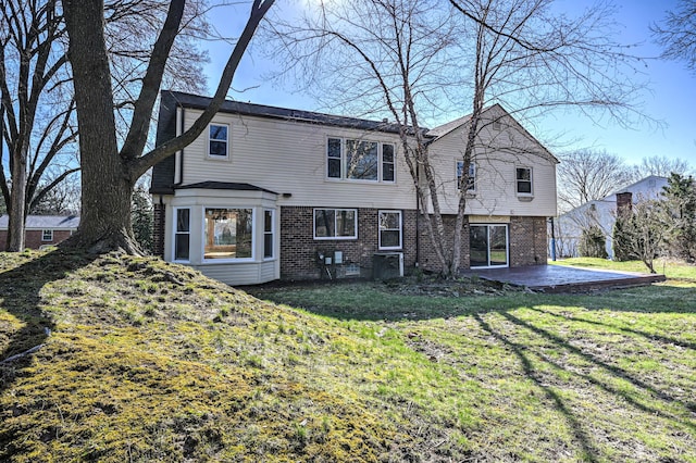 4238 Still Meadow Ln, West Bloomfield, MI 48323 - back of house featuring a patio area, brick siding, and a yard