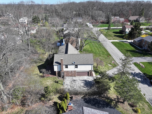 4238 Still Meadow Ln, West Bloomfield, MI 48323 - aerial view of residential area featuring a heavily wooded area