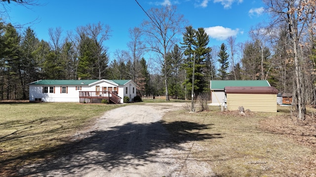 view of road with driveway