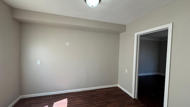 5051 Courville St, Detroit, MI 48224 - unfurnished room with dark wood-type flooring and baseboards