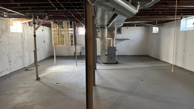 5051 Courville St, Detroit, MI 48224 - below grade area featuring plenty of natural light and heating unit