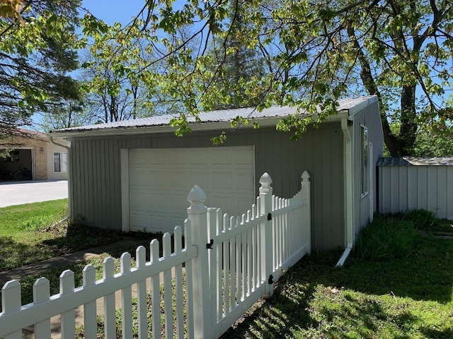 702 Oda St, Davison, MI 48423 - view of outbuilding featuring fence and an outbuilding