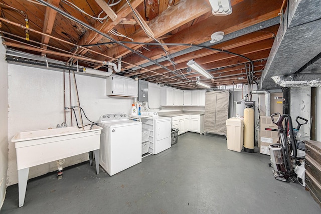 unfinished basement with washing machine and dryer