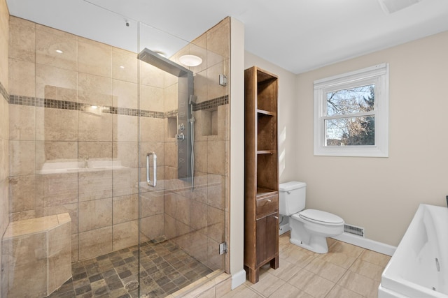 full bath with toilet, a stall shower, baseboards, tile patterned flooring, and visible vents