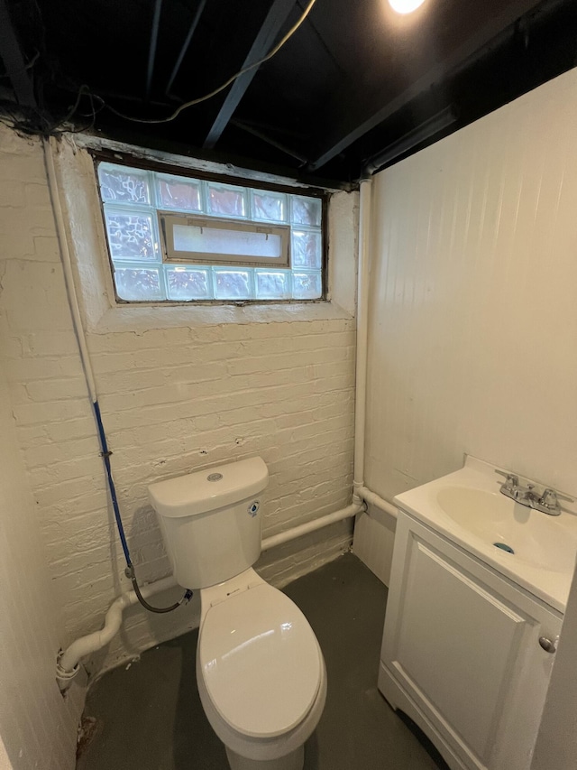 bathroom with toilet and vanity