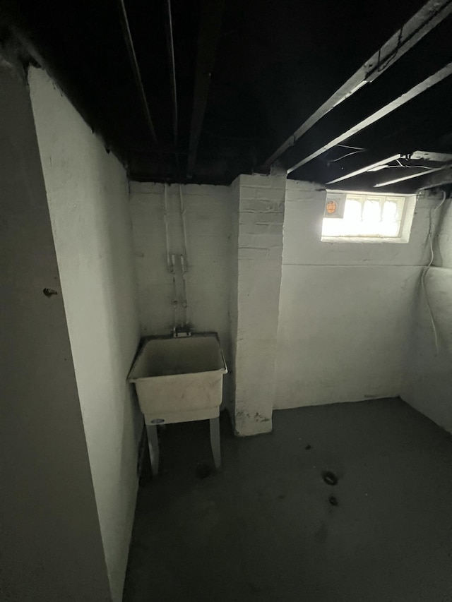 basement with a sink