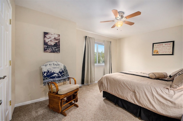 bedroom with baseboards, a ceiling fan, and carpet flooring