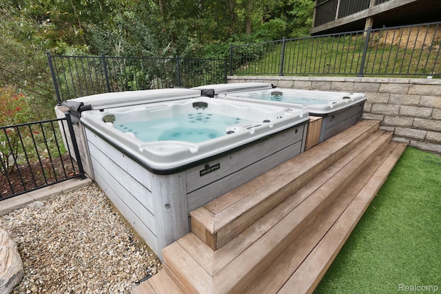 10630 Garr Rd, Berrien Springs, MI 49103 - wooden deck featuring a covered hot tub