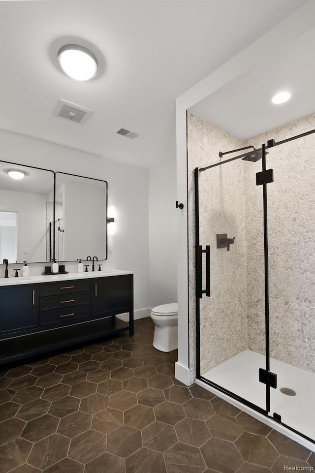 10630 Garr Rd, Berrien Springs, MI 49103 - bathroom with double vanity, a shower stall, and tile patterned floors